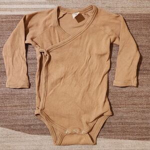 Kate Quinn long sleeve wrap bodysuit